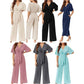Elegant jumpsuit för dam med V-ringning, vida ben och knytning i midjan