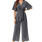Elegant jumpsuit för dam med V-ringning, vida ben och knytning i midjan