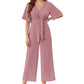 Elegant jumpsuit för dam med V-ringning, vida ben och knytning i midjan