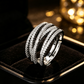 💍 JUSTERBAR CZ-RING MED KORSAD DESIGN — Glittrande pavé och elegant design med flera band ✨