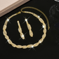 💎Set med halsband och örhängen med glittrande strass och klorformad kedja för kvinnor