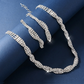 💎Set med halsband och örhängen med glittrande strass och klorformad kedja för kvinnor