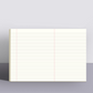 Anteckningsblock med minimalistiskt linjerat papper